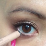 Tight lining your bottom lash line with a nude pencil for brighter eyes.
