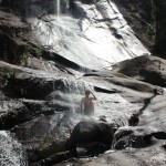 sevenwells and meSeven Wells Waterfall in Langkawi Malaysia, sitting under the waterfall by facemadeup.com