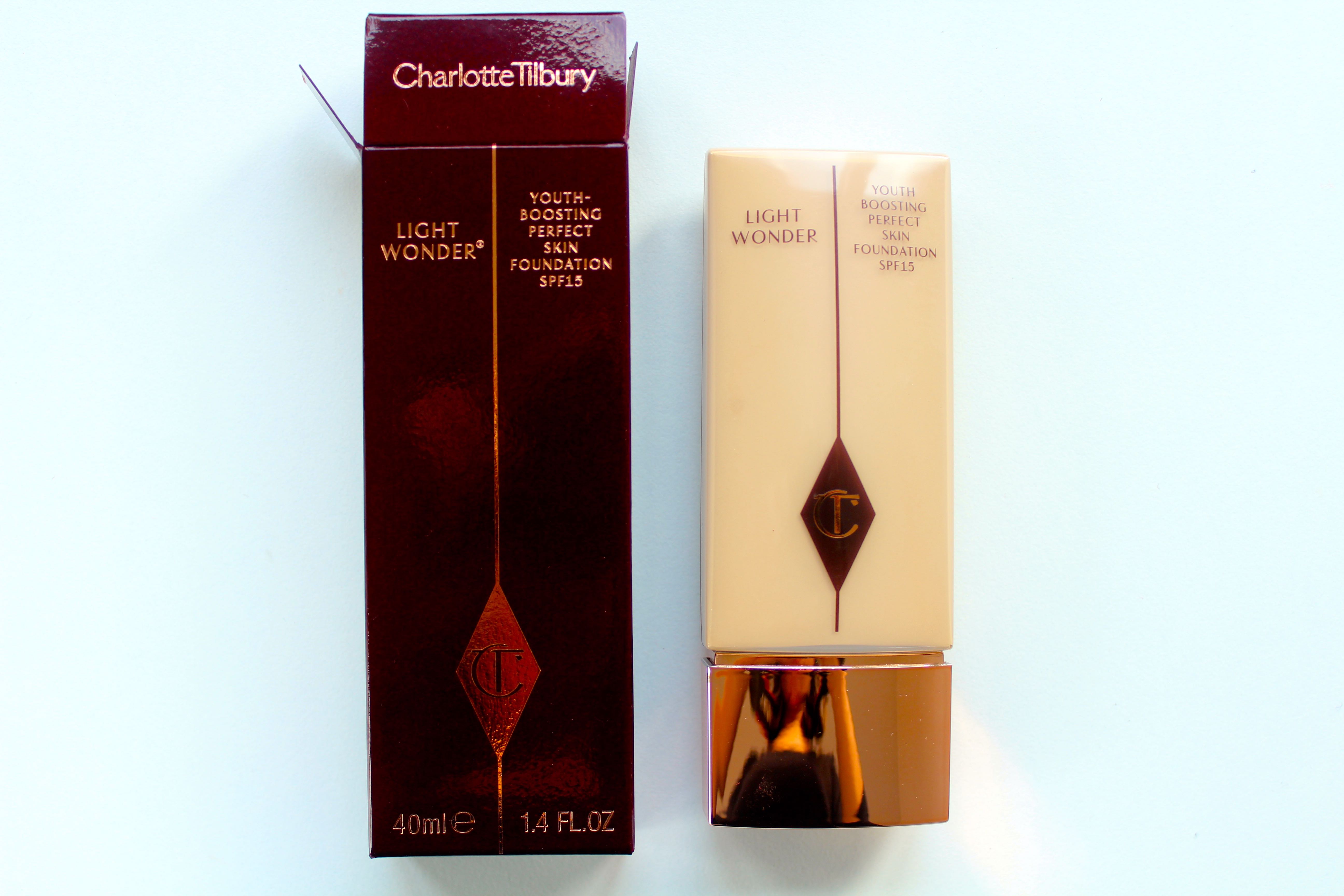 Charlotte-Tilbury-Haul-and-product-review-all-in-one-Light-Wonder-Foundation-in-shade-medium-6-and-box-packaging-by-face-made-up-facemadeup